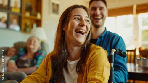 A man and woman are shown laughing together, with the woman seated in a wheelchair