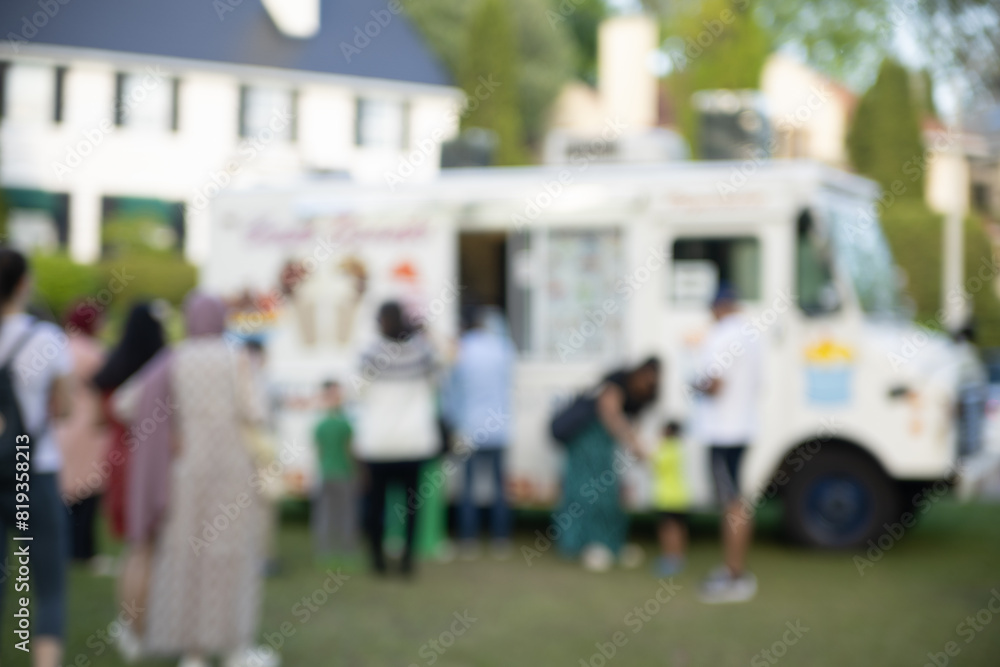 Abstract blurred background of food trucks.
