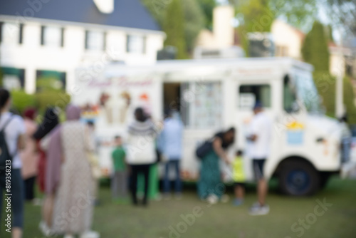 Abstract blurred background of food trucks.