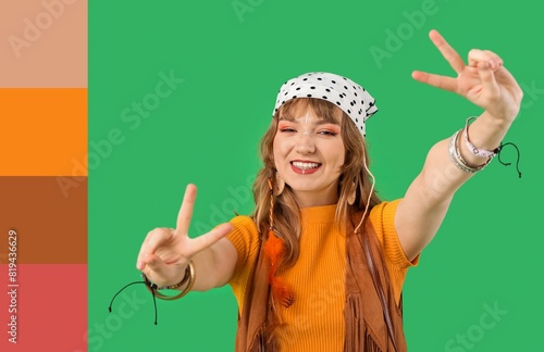 Female hippie showing victo...