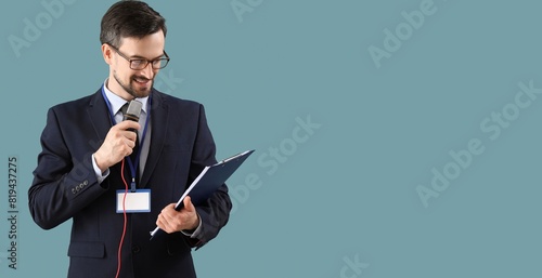 Male journalist with microp...
