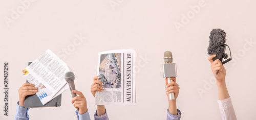 Female hands with newspaper...