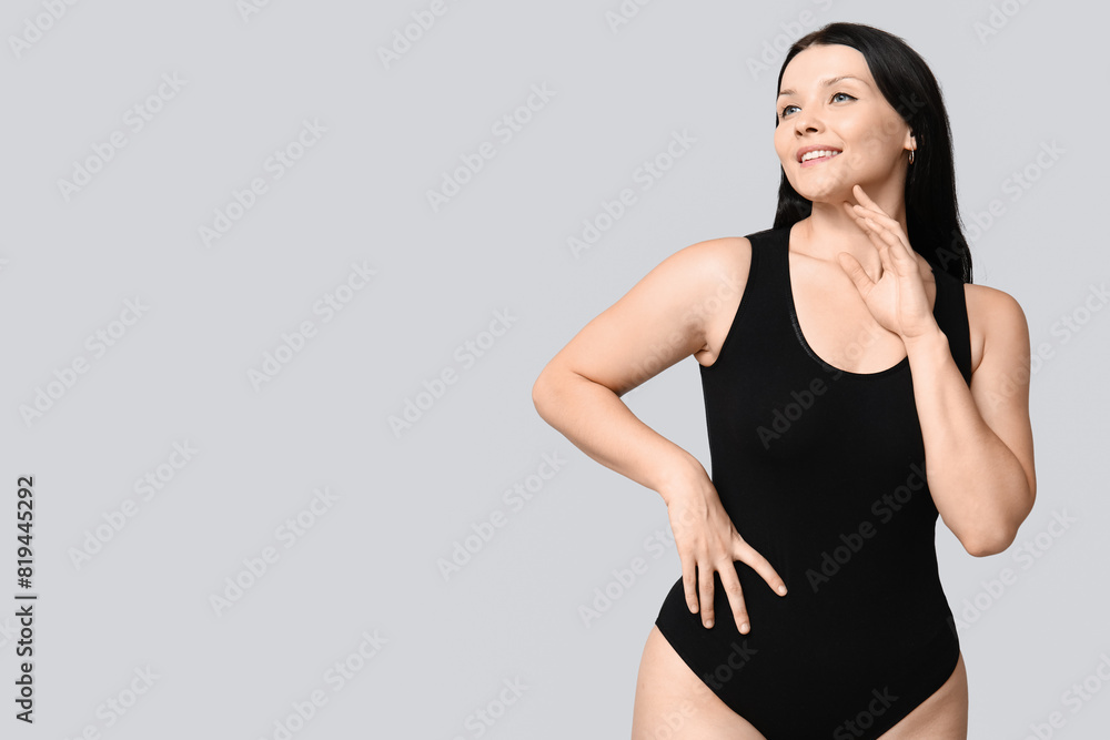 Body positive woman on light background Body positive woman on light background