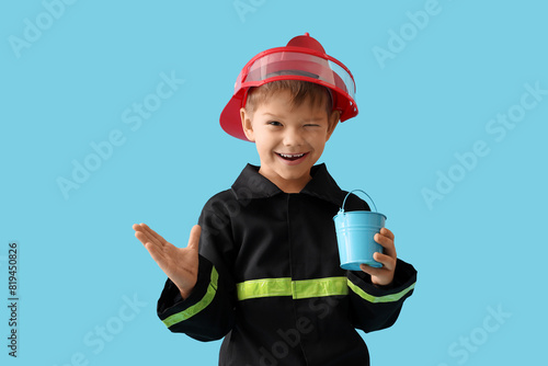 Cute little firefighter wit...