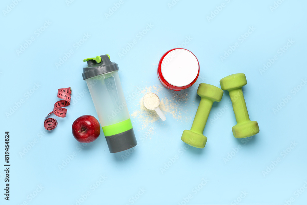 Obraz premium Composition with protein powder, bottle, dumbbells and measuring tape on color background