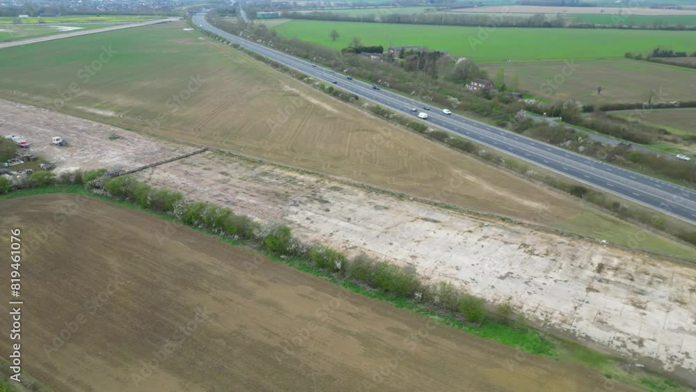 High Angle View of British Roads at Countryside Landscape of Highfields Village, Cambridgeshire, England UK. March 21st, 2024 High Angle View of British Roads at Countryside Landscape of Highfields Village, Cambridgeshire, England UK. March 21st, 2024