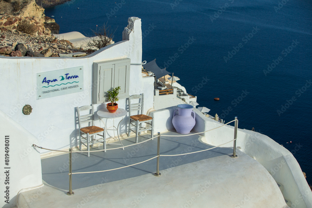 Obraz premium Beautiful sea view, white house, blue and white architecture, greek orthodox churche, Travel and summer vacacion, Architecture details in Santorini Greece, romantic seascape to the blue Aegean sea. 