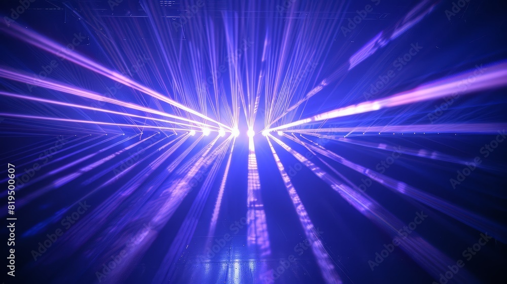 Blue and violet laser beams illuminate the black background, forming a striking and vivid light display. The beams' brilliance and the stark contrast with the dark backdrop create a captivating Blue and violet laser beams illuminate the black background, forming a striking and vivid light display. The beams' brilliance and the stark contrast with the dark backdrop create a captivating