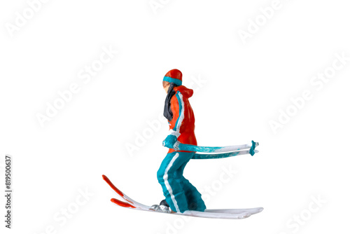 Miniature people , A skier full length Isolated with clipping path