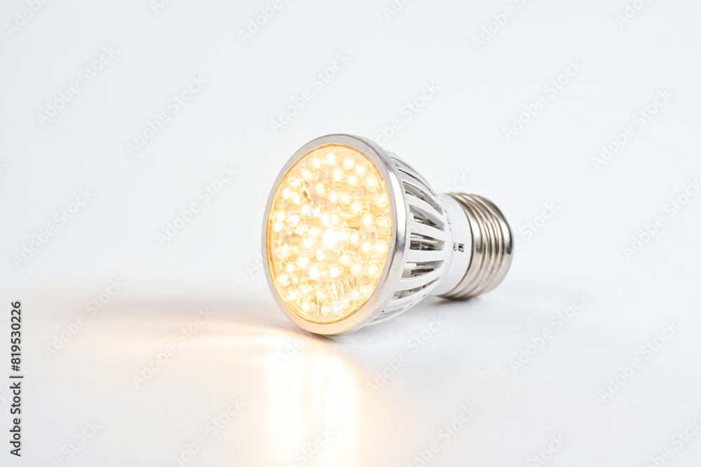Close up of a modern LED light bulb on a white background Close up of a modern LED light bulb on a white background