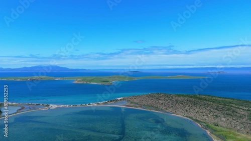 Ayvalik Sarimsakli beach and ancient quarry unique rock shapes sea blue sky photo