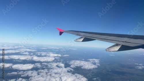 flying on air plane view from the window passenger perspective sunny day journy inspirational tourism vacation amateur video photo