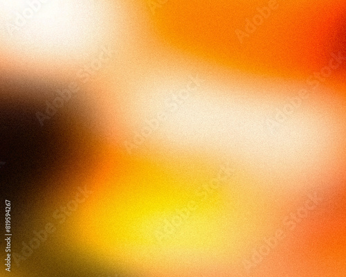 close-up of a blurred background in shades of yellow, orange, and brown. The colors evoke a sense of warmth and energy. It could be used as a background for a variety of purposes, such as a website.