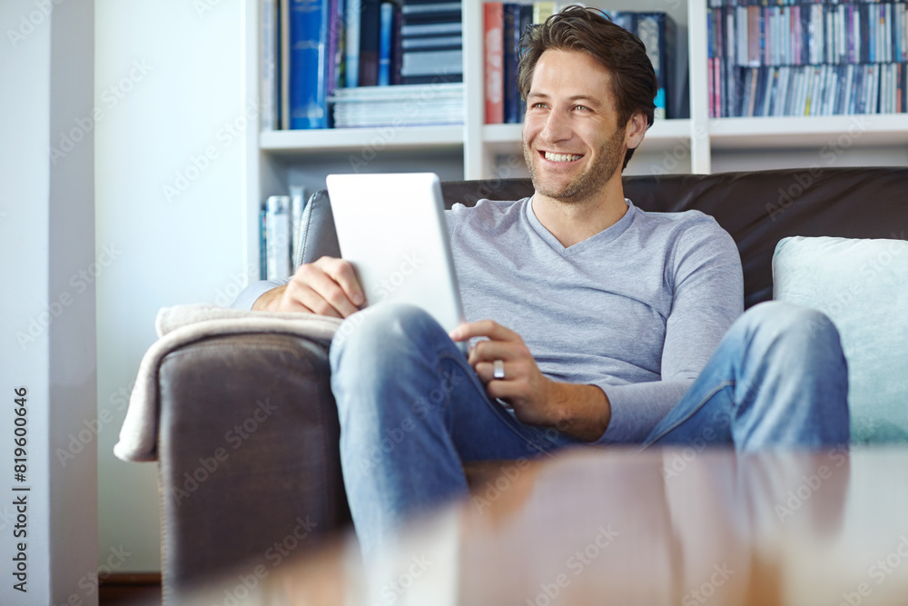 Man, thinking and smile on sofa with tablet for social media memory, online gaming and morning news in lounge of home. Person, happy or digital tech for reading ebook, web search or browsing on couch Man, thinking and smile on sofa with tablet for social media memory, online gaming and morning news in lounge of home. Person, happy or digital tech for reading ebook, web search or browsing on couch