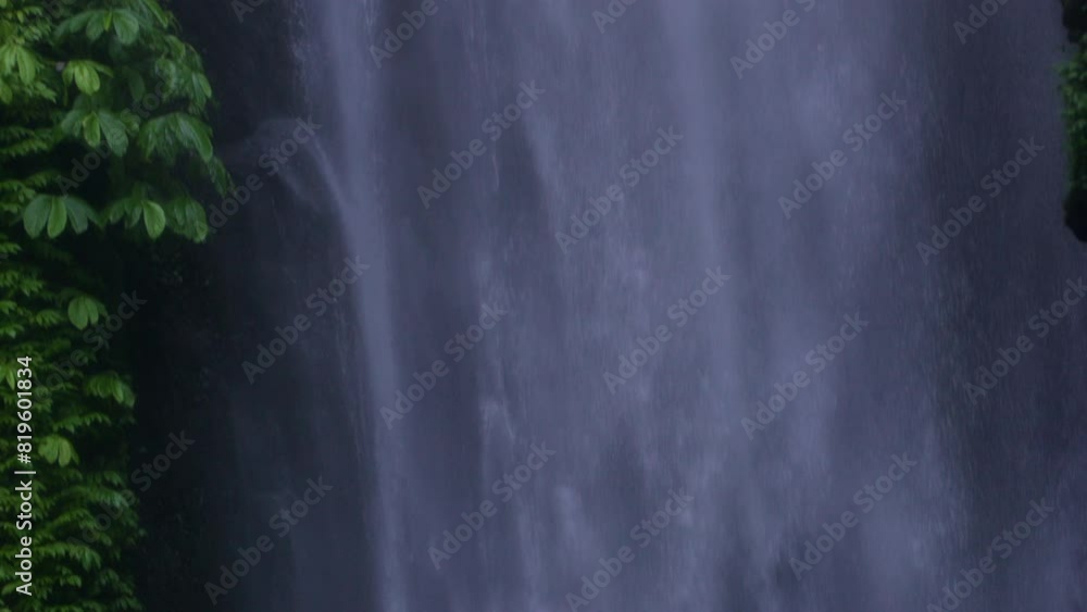Close-up Waterfall Flows Falling Down Slow Motion Tilt Down Close-up Waterfall Flows Falling Down Slow Motion Tilt Down