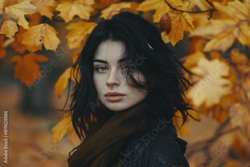 Woman Dark. Authentic Caucasian Beauty Standing in Autumn Leaves
