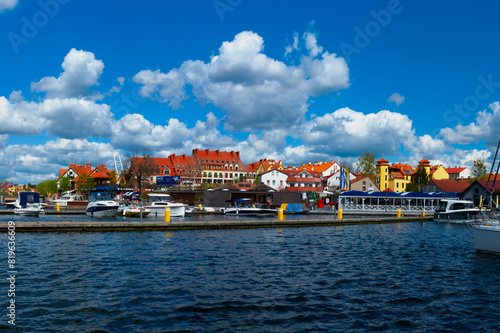 2023-04-28   Lake of town  marina for yachts and boats at the waterfront. Mikolajki  Poland.