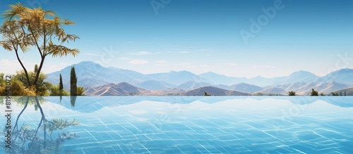 Detailed swimming pool with a clear water reflection of the surrounding scenery is shown in the copy space image photo