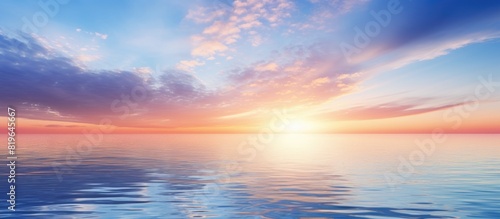A picturesque sunset scene over the Baltic Sea with a beautiful sky reflecting on the calm waters perfect for a copy space image