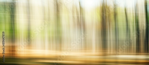 Blur the background of the forest to create a defocused abstract copy space image