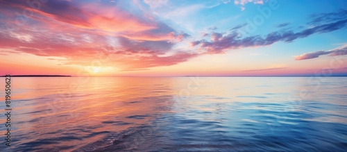 A picturesque sunset scene over the Baltic Sea with a beautiful sky reflecting on the calm waters perfect for a copy space image