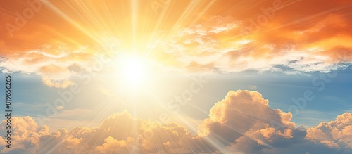 Bright sunshine illuminating a cloudy sky with copy space image