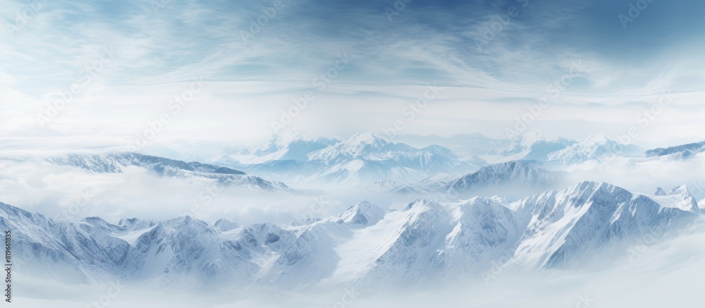 Aerial photograph showcasing stunning mountain landscapes with a vast expanse of snow covered peaks and valleys suitable for use as a copy space image