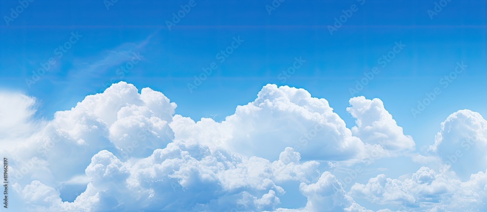 Cloud texture against a blue sky with ample copy space image Cloud texture against a blue sky with ample copy space image