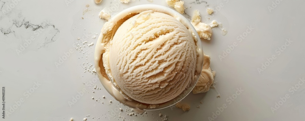 Fototapeta premium Closeup top view of an ice cream ball, creamy texture and rich color, on a clean white surface, perfect for food photography