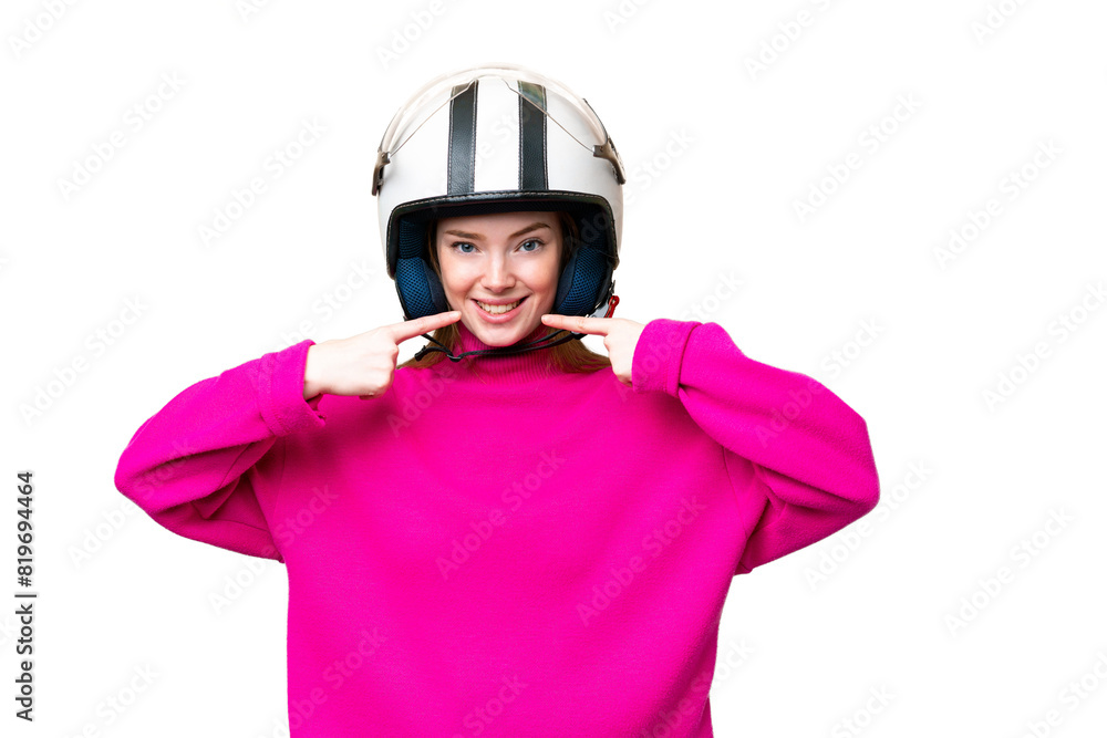 Young pretty woman with a motorcycle helmet over isolated chroma key background giving a thumbs up gesture Young pretty woman with a motorcycle helmet over isolated chroma key background giving a thumbs up gesture