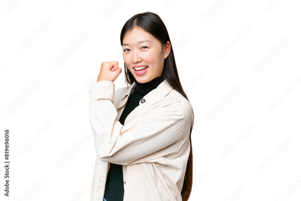 Young Asian woman over isolated chroma key background celebrating a victory Young Asian woman over isolated chroma key background celebrating a victory