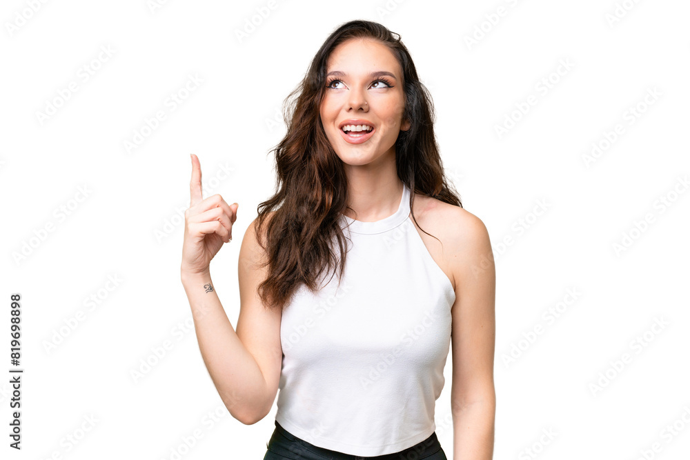 Young caucasian woman isolated over isolated background pointing up and surprised Young caucasian woman isolated over isolated background pointing up and surprised