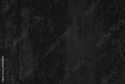 Old black concrete wall texture. Grunge background
