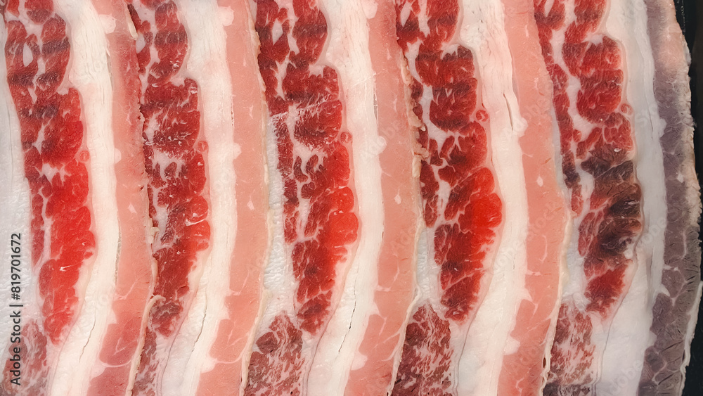 Fresh raw pork sirloin sliced. Top view Fresh raw pork sirloin sliced. Top view