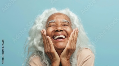 Joyful Elderly Woman Laughing photo