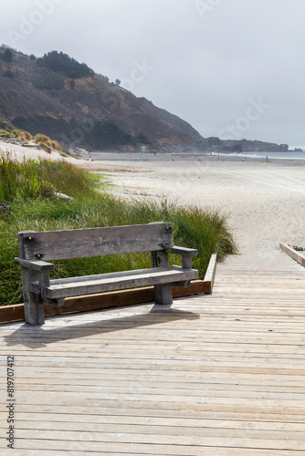 benches at a bridges on the foggy morning Stinson beach, california photo