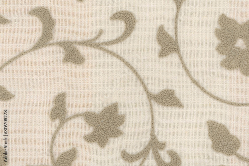 embroidered floral nouveau luxury fabric texture background close up, detailed light neutral color woven bridal linen backdrop, furniture cloth textile material, modern cotton clothing weave pattern