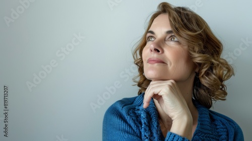Woman Contemplating with a Smile photo
