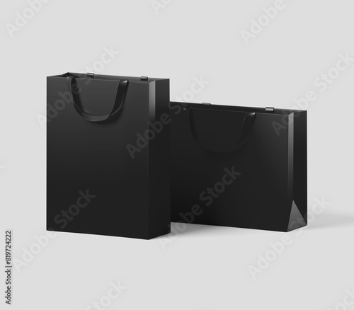 Black shopping bag for branding with place for your brand name or text, Mockup, 3d rendering, isolated on light background.
