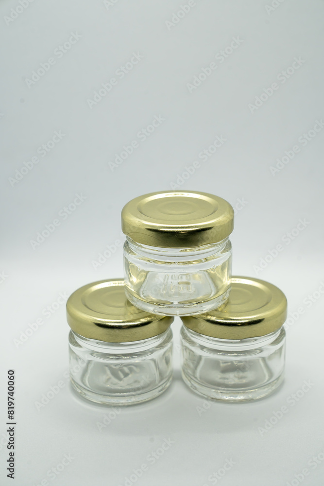 Three stacked jars on a white background Three stacked jars on a white background