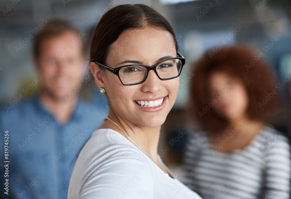 Portrait, leader and happy business woman in office for creative career, job and coworking with team in startup. Face, manager and confident professional entrepreneur, editor or employee with glasses Portrait, leader and happy business woman in office for creative career, job and coworking with team in startup. Face, manager and confident professional entrepreneur, editor or employee with glasses