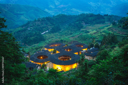 Tianluokeng Tulou cluster located in the village of Tianluokeng, fujian, china photo