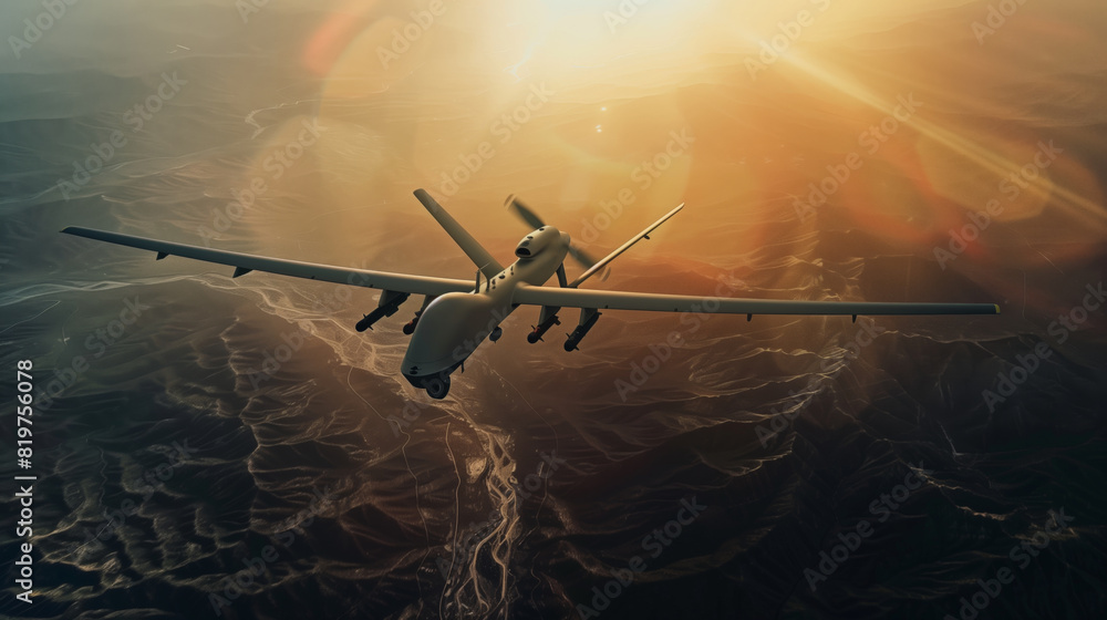 Naklejka premium Aerial view of a combat military drone in the sky at sunset. The concept of technology and power