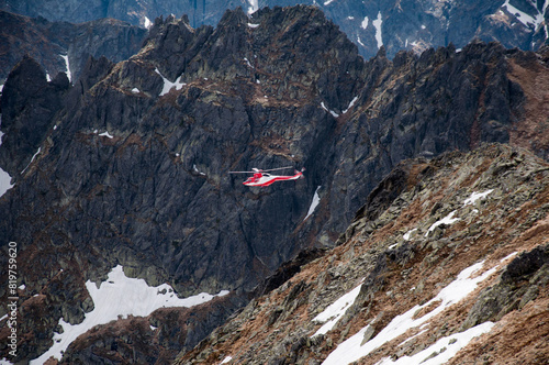 Mountain landscape with helicopter