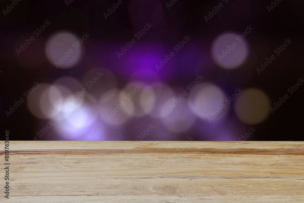 Empty wooden table top With light purple bokeh of coffee shop background Template for displaying product presentations Model creative internal ideas.