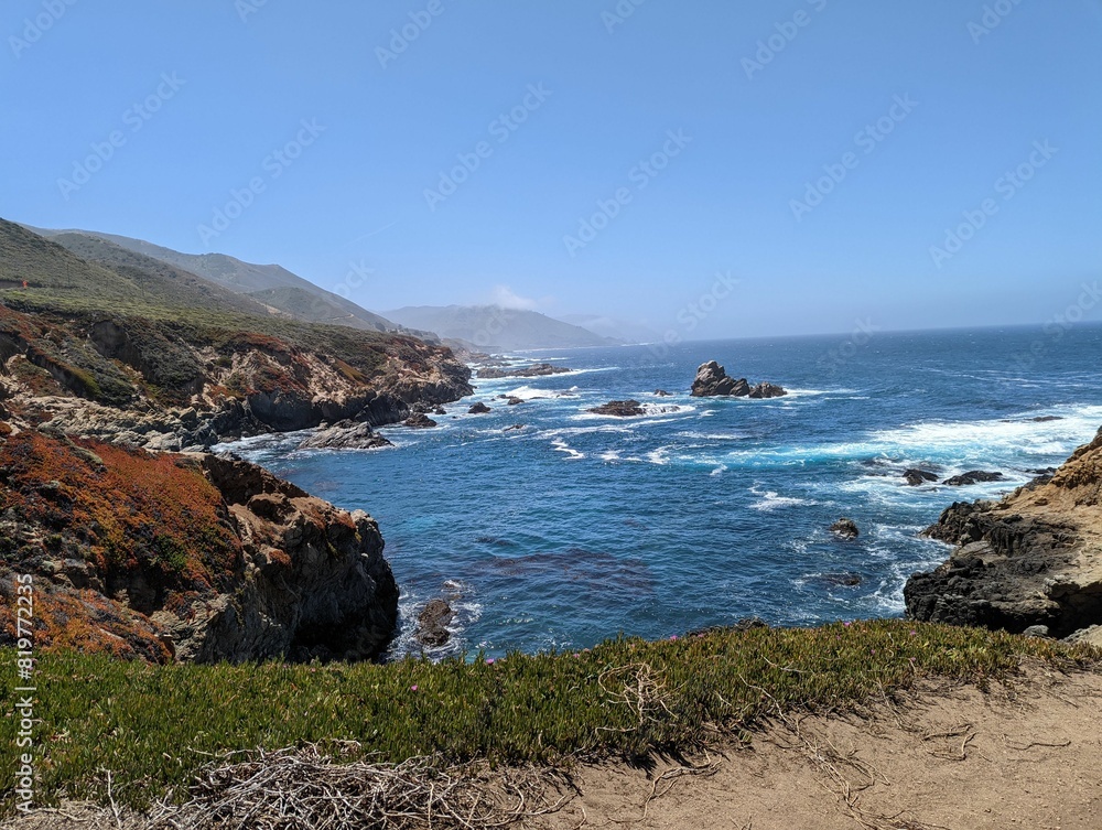 Rocky coastline on a sunny day Rocky coastline on a sunny day