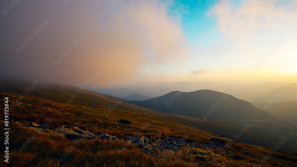 Beautiful sunset in Carpathian mountains in foggy weather , around Shpytsi rocks, Ukraine Beautiful sunset in Carpathian mountains in foggy weather , around Shpytsi rocks, Ukraine