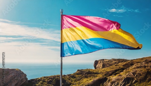 pansexual flag flutters against blue sky  lgbtq pride month