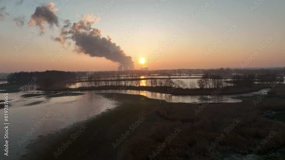 Aerial view of serene sunset scene on a flooded river in Peitz Brandenburg town, Germany Aerial view of serene sunset scene on a flooded river in Peitz Brandenburg town, Germany