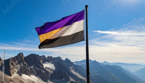 non-binary flag flies against the blue sky, lgbt pride month